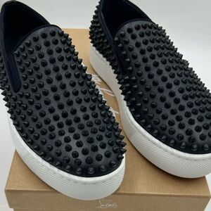 Men's Christian Louboutin spike boat slip on sneakers. Size 44 . US 11